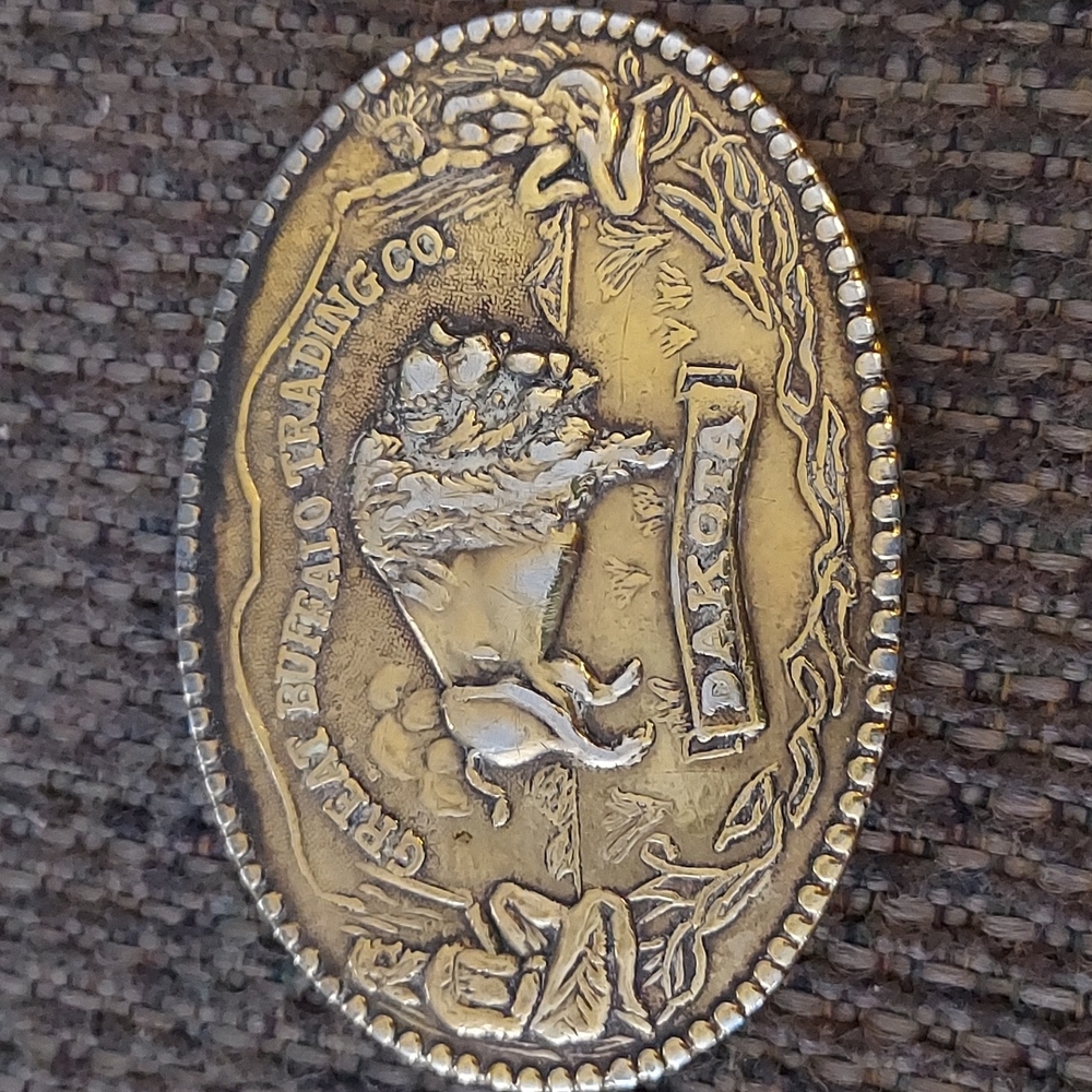 Brass cowboy belt buckle